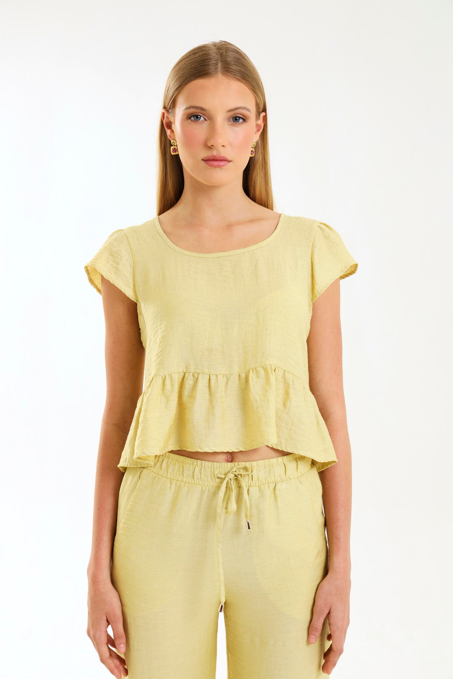 PEPLUM RUFFLE TOP / MISTED MARIGOLD
