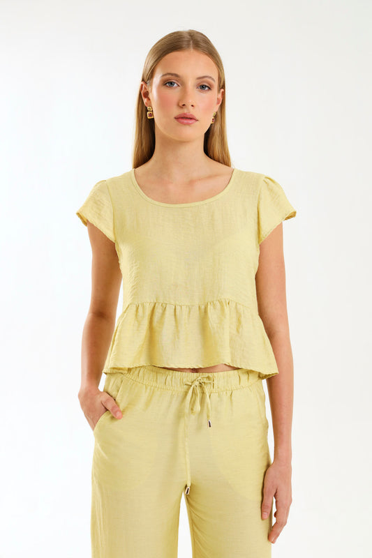 PEPLUM RUFFLE TOP / MISTED MARIGOLD