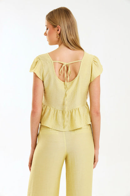 PEPLUM RUFFLE TOP / MISTED MARIGOLD