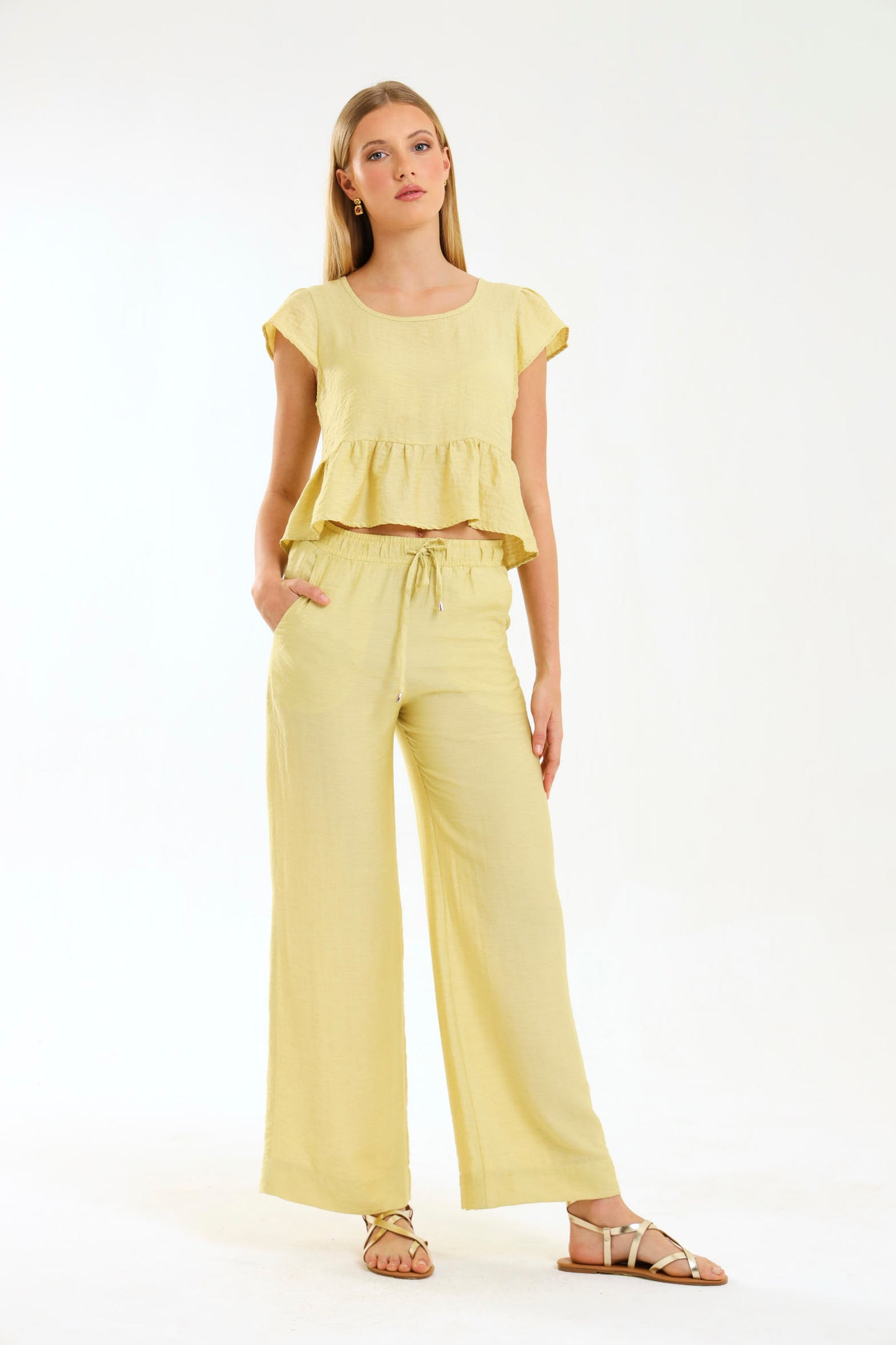 PEPLUM RUFFLE TOP / MISTED MARIGOLD